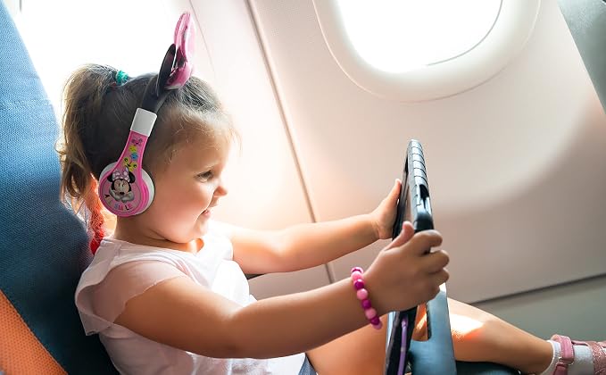 eKids Minnie Mouse Kids Bluetooth Headphones, Wireless with Microphone Includes Aux Cord, Volume Reduced Foldable Headphones for School, Home, or Travel, Pink